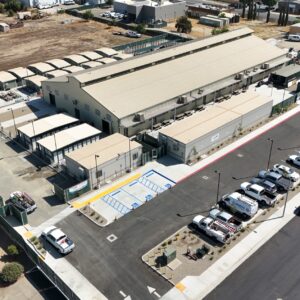 A high left angle view of the completed Emergency Shelter with all buildings installed and concrete work complete.