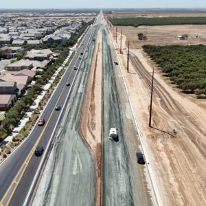Poured concrete parallel to the road.